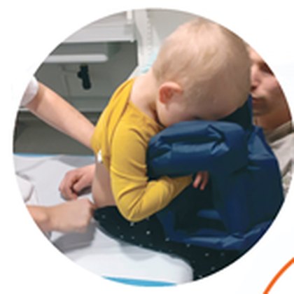 Enfant installé sur le coussin L3P